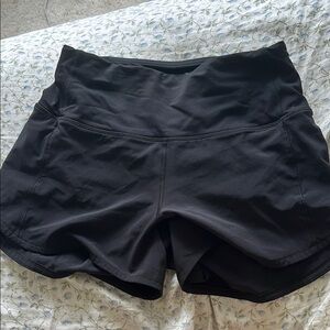 Lululemon black speed up high rise size 2